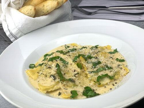 Sausage and Herb Ravioli w/ Champagne-Cream Sauce